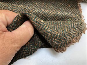 Beklædningsuld - sildebensmønster i nåle grøn / saltkaramel, tweed look med nister